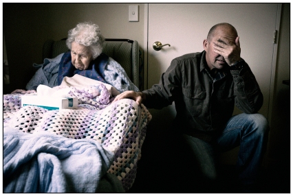 My big brother with my elderly grandmother who he visits daily.