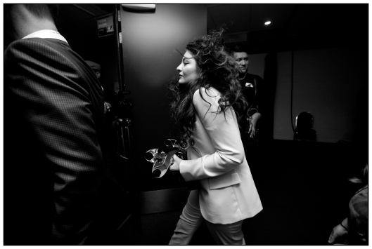 Lorde rushes out the door with her awards during the Vodafone New Zealand Music Awards held at Vector Arena, Auckland, New Zealand. 20 November 2014 New Zealand Herald Photograph by Dean Purcell.