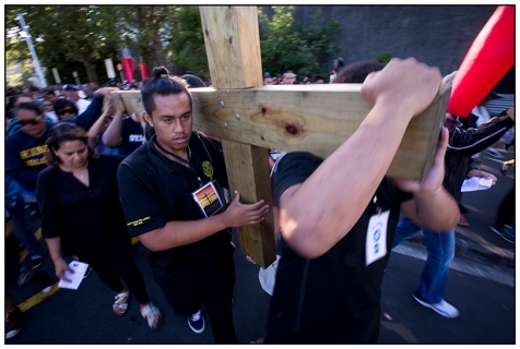 The Stations of the Cross that started in Albert Street, Auckland and made its way to St Patricks Cathedral on Good Friday. 03 April 2015 New Zealand Herald Photograph by Dean Purcell.